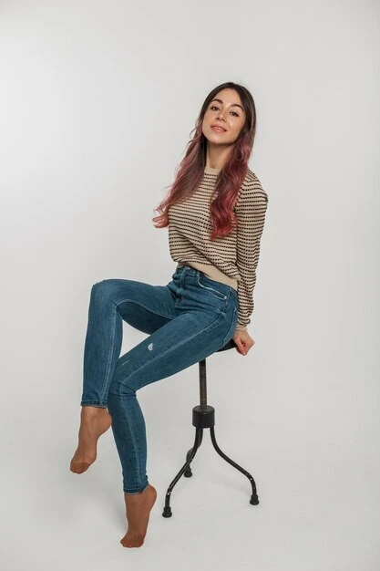 Handmade beautiful-young-fashionable-woman-model-fashion-casual-denim-clothes-with-vintage-sweater-jeans-sits-poses-chair-white-background_338491-21081.jpg - Handmade jewelry